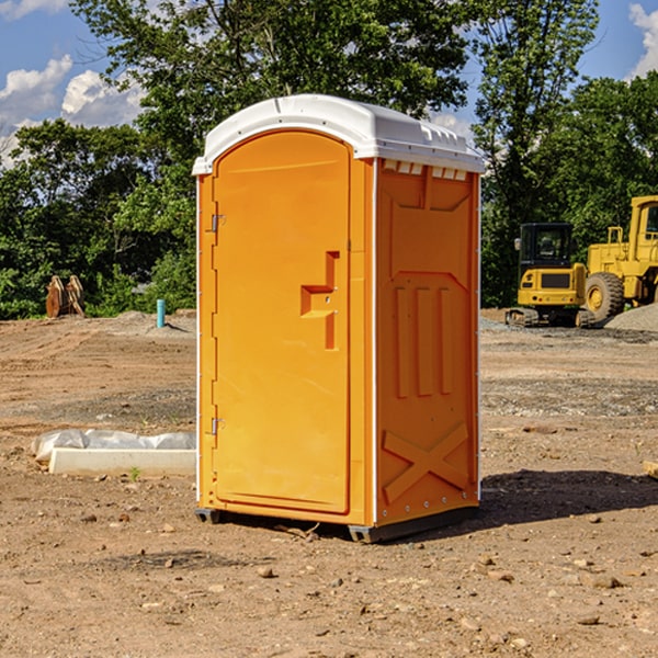 how often are the portable restrooms cleaned and serviced during a rental period in Florence